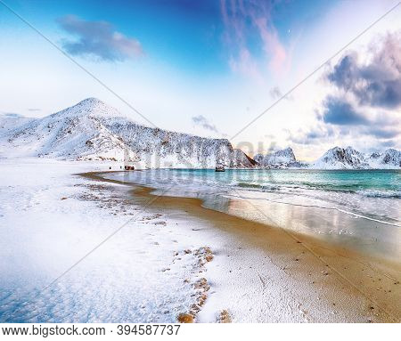 Fabulous Winter Scenery With Haukland Beach During Sunset And Snowy  Mountain Peaks Near Leknes.  Lo