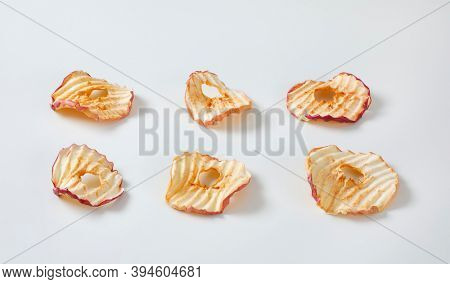Six apple chips (dried thin apple slices)