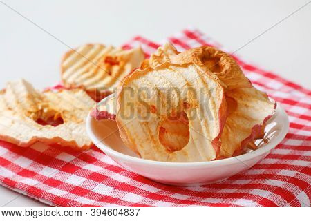 Bowl of dried apple slices - apple chips or rings