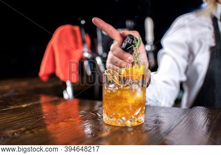 Confident Woman Barman Makes A Show Creating A Cocktail In Cocktail Bars