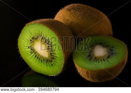 Ripe Juicy Kyvy On A Black Background