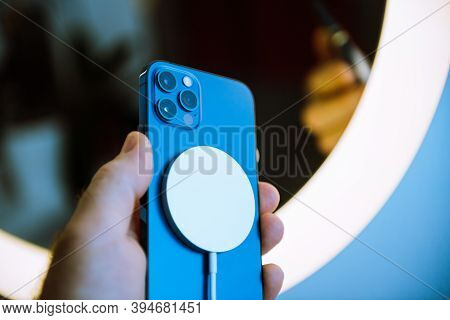 Paris, France - Nov 11, 2020: Magsafe Charger Othe Back Of The New Iphone 12 Pro Max 5g Smartphone M