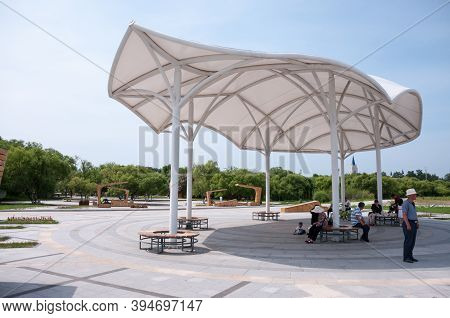 China, Heihe, July 2019: Roof From The Sun In The Park On The Embankment In Heihe City In Summer
