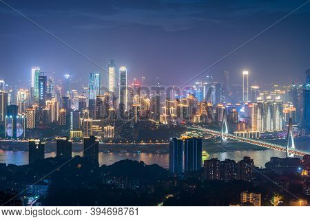 Chongqing, China - June 13, 2018 : Chongqing Skyline Aerial View And Dongshuimen Cable Bridge At Nig