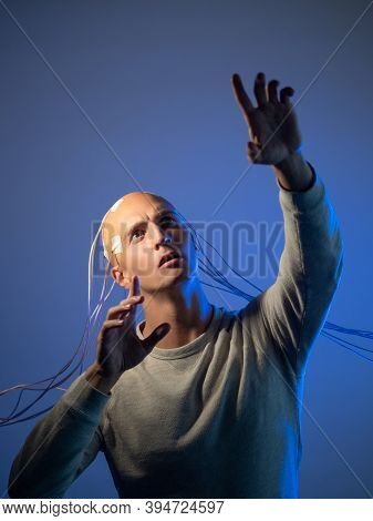 Bald Man With Electrodes In His Brain, Futuristic Concept, Transhumanism Idea Of Transferring Consci