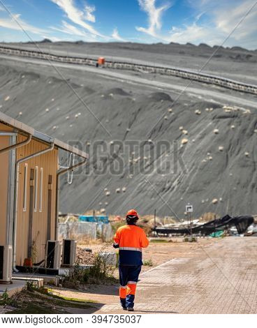 early morning mine worker onsite at the barracks near the tailings at a diamond mine in Botswana 