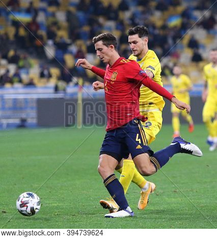 Kyiv, Ukraine - October 13, 2020: Pau Torres Of Spain (l) Fights For A Ball With Roman Yaremchuk Of 