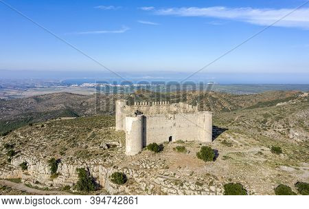 Medieval Castle Called El Montgri At The Top  Mountain Near The Sea In Costa Brava, Catalonia Spain
