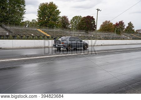 Milan, Michigan / Usa - 10-03-2020: Drivers Testing Their Cars At A Test And Tune Event That Is Open