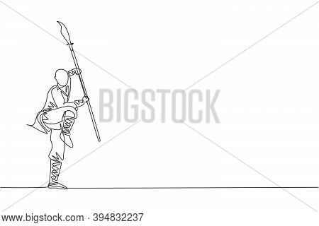 Single Continuous Line Drawing Of Young Muscular Shaolin Monk Man Holding Spear Training At Shaolin 