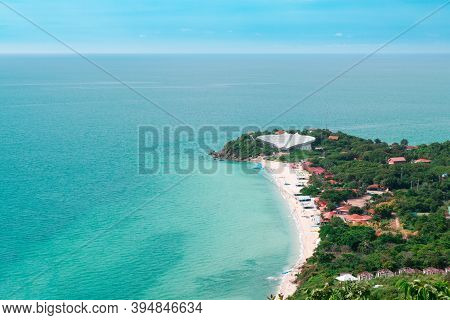 Aerial View From Thailand's Koh Larn Overlooking The Community And The Beaches With The Sea During T