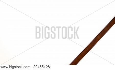 Brown Leather Belt On White Background. Decoration For Letter Or Text.