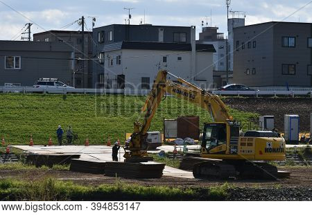 Sapporo Japan October 1 2020 The Escavator On The Construction Site Along With The Riverside