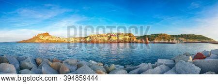 Stunning View Of Medieval Town Of Castelsardo. Cityscape Of Castelsardo Marina At Sunset.  Location:
