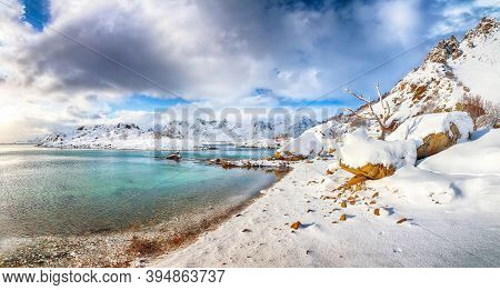 Fabulous Winter Scenery With Lots Of Snow  In Small Fishing Village And Snowy  Mountain Peaks Near V
