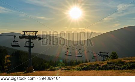 Cable Car In A Hilly Landscape During Sunset - Kouty Nad Desnou, Jeseniky, Czech Republic.