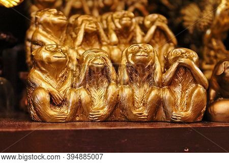 Four Wise Monkeys - Malaysian Souvenir Of Chimps Depicting Embodying The Proverbial Principle Of The