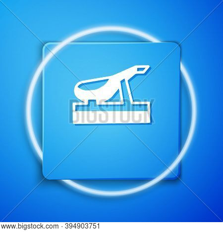 White Spanish Jamon On The Wooden Jamonera Icon Isolated On Blue Background. Blue Square Button. Vec