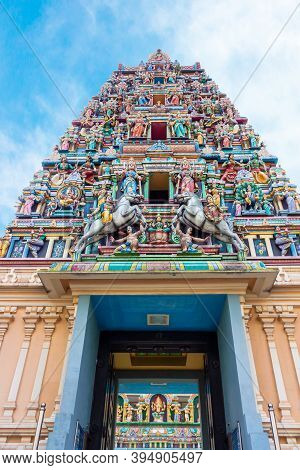 Fragment Of Sri Maha Mariamman Temple Entrance With Tower Or 5-tiered Gopuram Decorated With Colorfu
