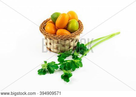 Citrus Fruits In Basket Exotic Kumquats And Limequats On White Isolated Background