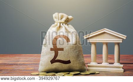 British Pound Sterling Money Bag And Bank / Government Building. Tax Collection And Budgeting. Monet