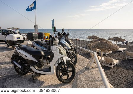 Santorini, Greece - September 16, 2020: Motorcycles Parked At The Vlychada Beach. Santorini Island, 