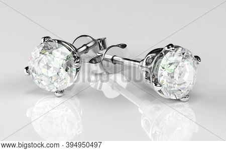 Earrings With Diamond On A White Background. Jewelry For Women. 3d Rendering