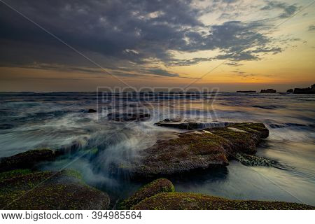 Calm Ocean Long Exposure. Stones In Mysterious Mist Of The Sea Waves. Concept Of Nature Background. 