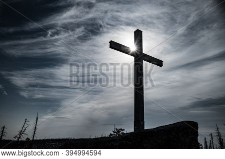 Silhouette Of A Summit Cross
