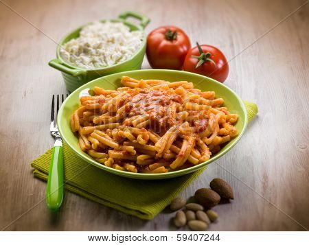 casarecce with ricotta ad almond sicily recipe, selective focus