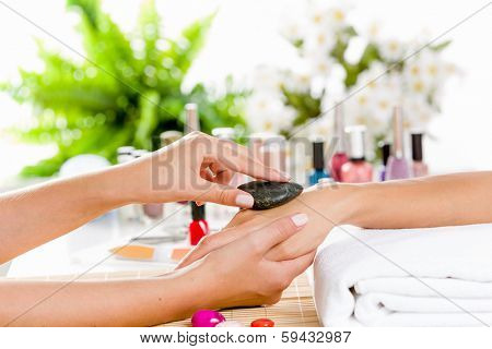 Close up of process of hand massage at beauty salon