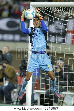 BARCELONA - DEC, 30: Cape Verdean goalkeeper Vozinha in action during the friendly match between Catalonia and Cape Verde at Olympic Stadium on December 30, 2013 in Barcelona, Spain