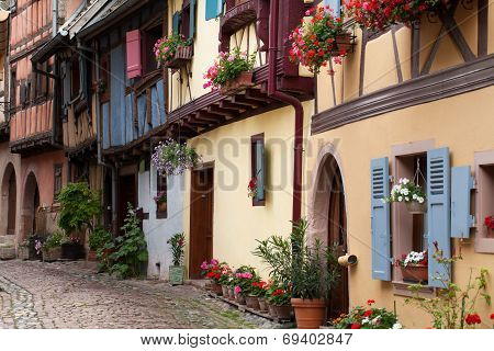Street with half-timbered medieval houses in Eguisheim