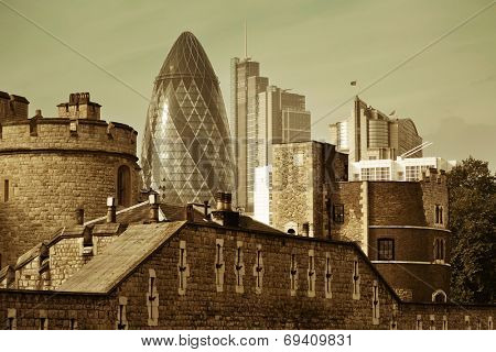 LONDON, UK - SEP 27: Group of financial district office buildings on September 27, 2013 in London, UK. London is the world's greatest foreign exchange market with major trade conducted in district