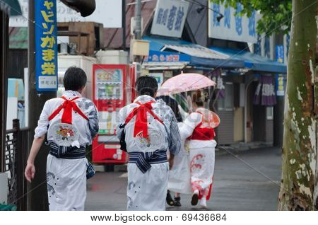 Japanese People walking around the town