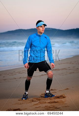 Athlete Standing On The Beach