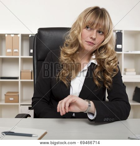Businesswoman Looking At Her Watch