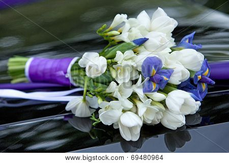 bouquet of flowers blue and white colors of irises and tulips for the wedding