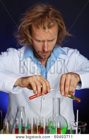 Crazy scientist working in laboratory