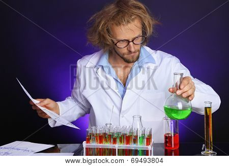 Crazy scientist working in laboratory