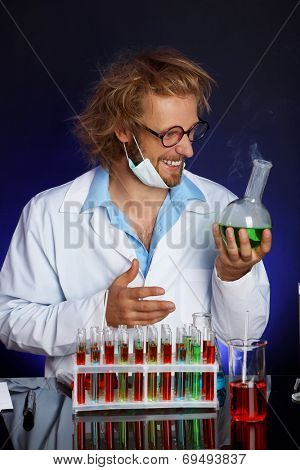 Crazy scientist working in laboratory