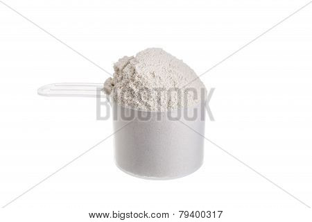 Measuring Spoon For Milk Whey Protein. On A White Background.