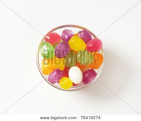 overhead view of glass bowl with fruit candies
