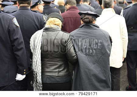 Officers as hearse passes by