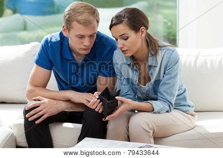Upset Marriage Looking At Empty Wallet