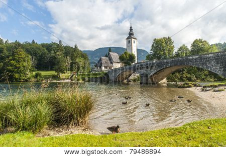 Bohinj lake with church and bridge, Slovenia