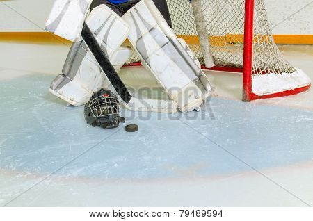 Hockey Goalie In Crease Getting Ready