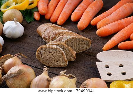 Bread with fresh vegetables on the table