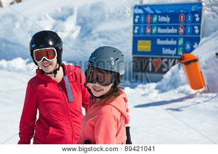 Two Sisters Skiing In Austria