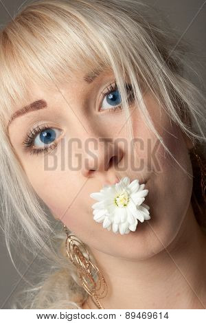Woman with a Chrysanthemum in Her Mouth